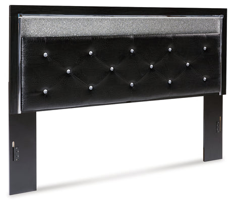 Kaydell King Upholstered Panel Headboard with Mirrored Dresser, Chest and Nightstand in Black - PKG014237