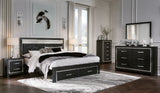 Kaydell King Upholstered Panel Storage Bed with Mirrored Dresser, Chest and 2 Nightstands in Black - PKG014262