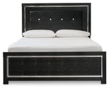 Kaydell Queen Upholstered Panel Bed with Mirrored Dresser and Nightstand in Black - PKG014128