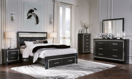 Kaydell Queen Upholstered Panel Storage Platform Bed with Mirrored Dresser, Chest and 2 Nightstands in Black from Ashley - Luna Furniture