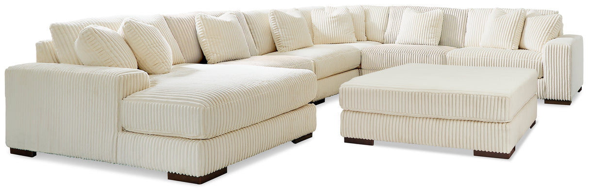 Lindyn 6-Piece Sectional with Ottoman in Ivory - PKG016103