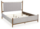 Lyncott California King Upholstered Bed with Dresser and Nightstand in Brown - PKG020447