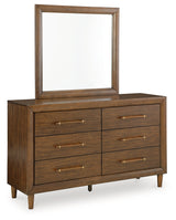 Lyncott California King Upholstered Bed with Mirrored Dresser and Nightstand in Brown - PKG018773