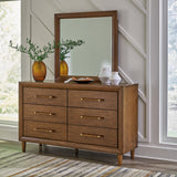 Lyncott King Upholstered Bed with Mirrored Dresser, Chest and 2 Nightstands in Brown - PKG018986