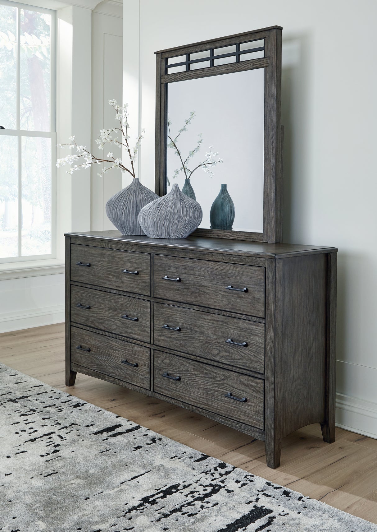 Montillan California King Panel Bed with Mirrored Dresser and Chest in Grayish Brown from Ashley - Luna Furniture