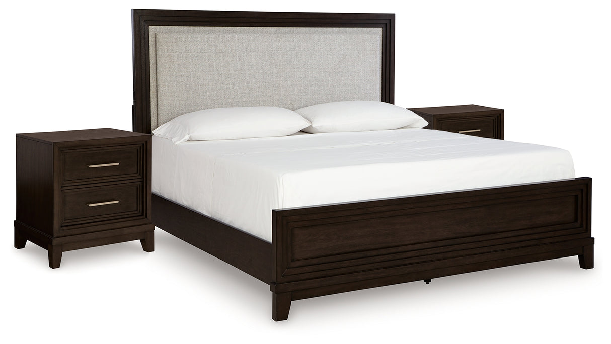 Neymorton California King Upholstered Panel Bed with 2 Nightstands in Dark Grayish Brown from Ashley - Luna Furniture