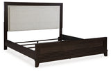 Neymorton California King Upholstered Panel Bed with 2 Nightstands in Dark Grayish Brown from Ashley - Luna Furniture