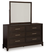 Neymorton California King Upholstered Panel Bed with Mirrored Dresser and Chest in Dark Grayish Brown from Ashley - Luna Furniture