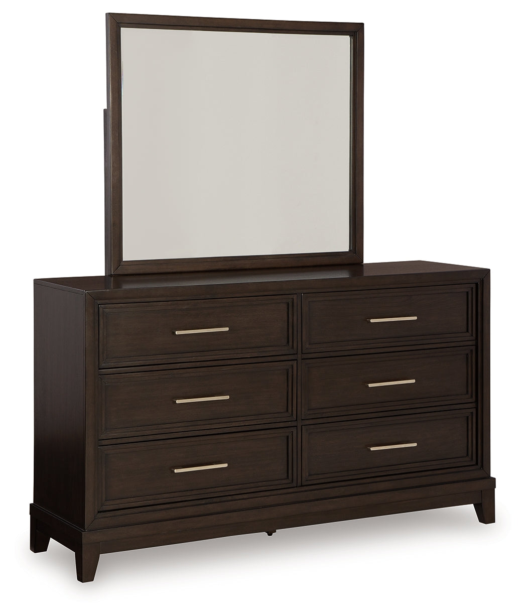 Neymorton California King Upholstered Panel Bed with Mirrored Dresser and Nightstand in Dark Grayish Brown from Ashley - Luna Furniture