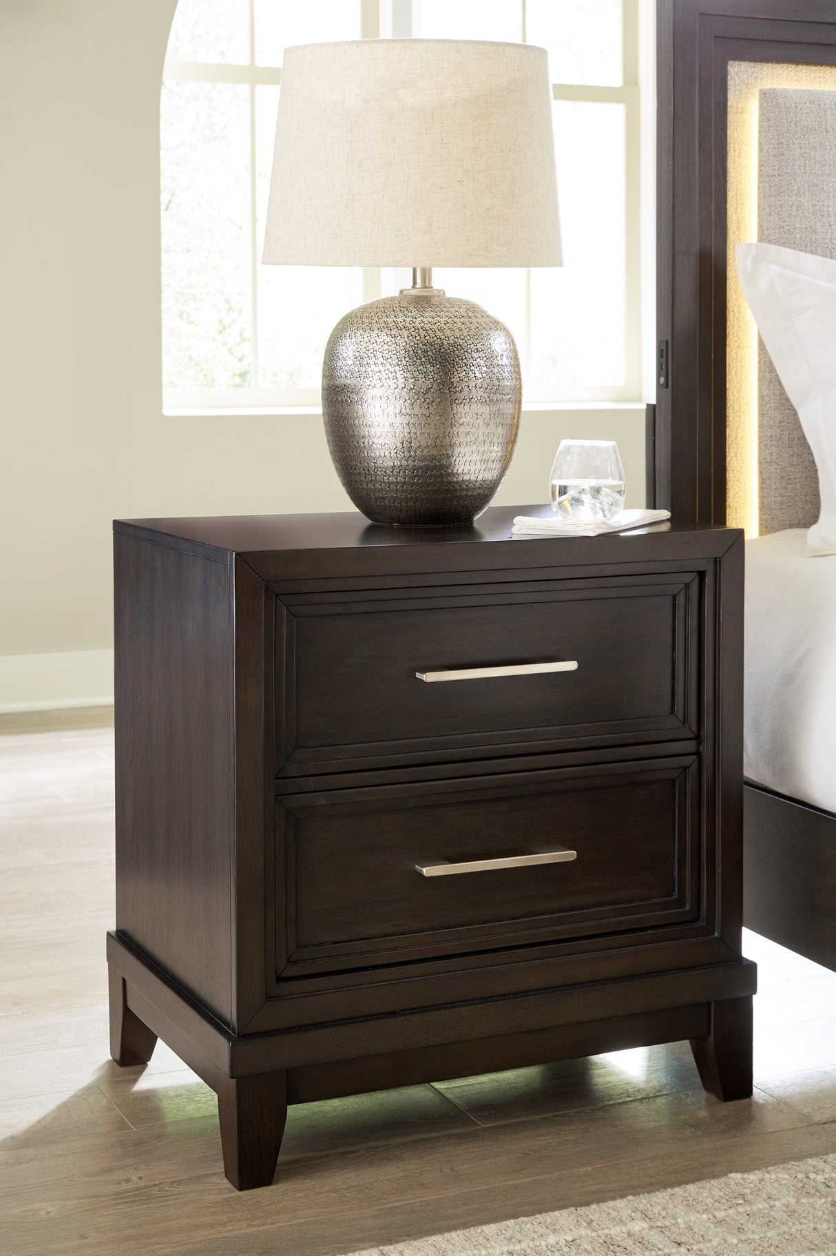 Neymorton California King Upholstered Panel Bed with Mirrored Dresser, Chest and Nightstand in Dark Grayish Brown from Ashley - Luna Furniture