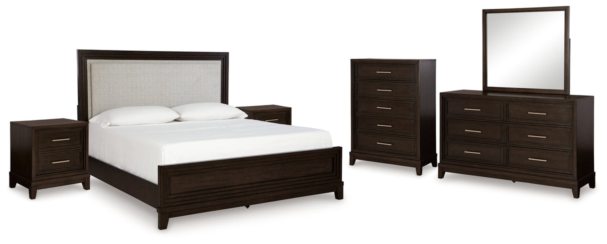 Neymorton King Upholstered Panel Bed with Mirrored Dresser, Chest and 2 Nightstands in Dark Grayish Brown from Ashley - Luna Furniture