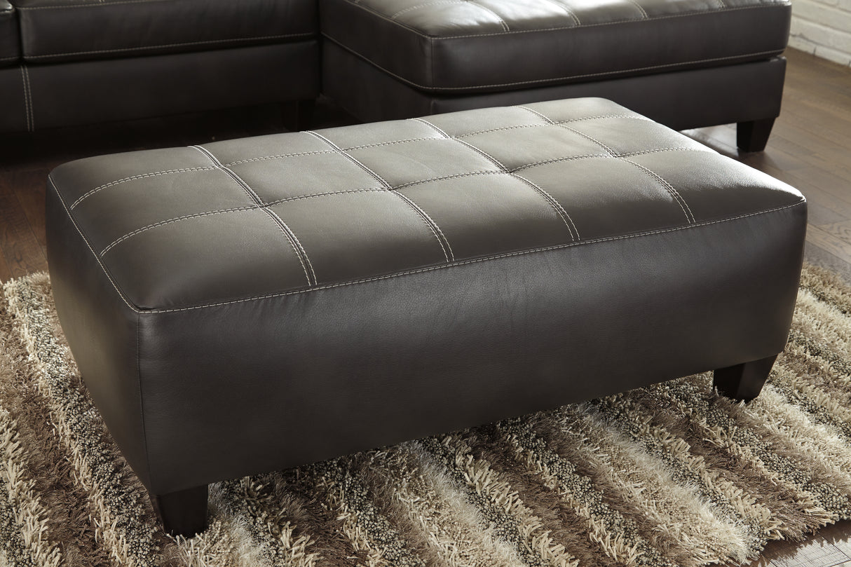 Nokomis 2-Piece Sectional with Ottoman in Charcoal - PKG011026