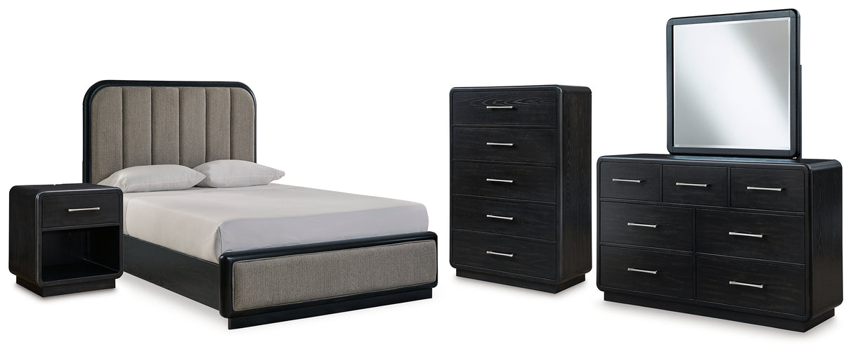 Rowanbeck Queen Upholstered Panel Bed with Mirrored Dresser, Chest and Nightstand in Gray/Black - PKG018795