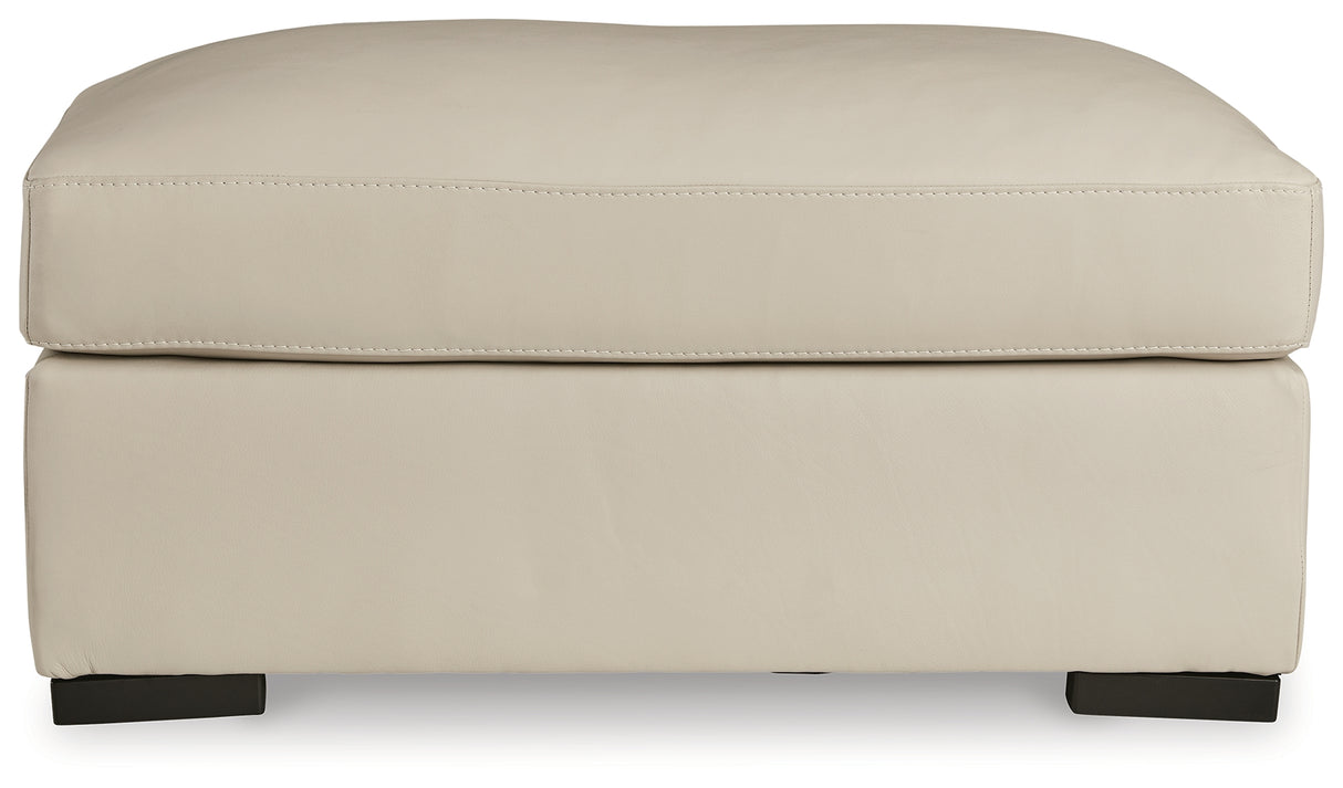 Tresure Trove Almond Ottoman from Ashley - Luna Furniture