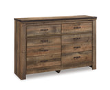 Trinell King Panel Bed with Dresser and Chest in Brown from Ashley - Luna Furniture