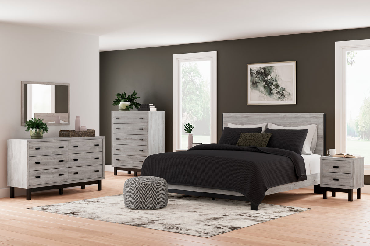 Vessalli King Panel Bed with Mirrored Dresser, Chest and 2 Nightstands in Gray - PKG015137