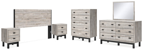 Vessalli King Panel Headboard with Mirrored Dresser, Chest and 2 Nightstands in Two-tone from Ashley - Luna Furniture