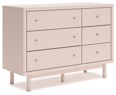 Wistenpine Full Upholstered Panel Bed with Dresser in Blush from Ashley - Luna Furniture