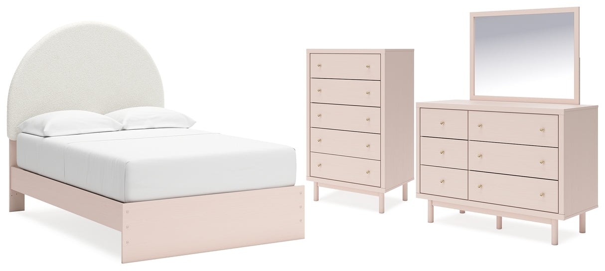 Wistenpine Full Upholstered Panel Bed with Mirrored Dresser and Chest in Blush - PKG018724