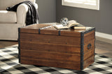 Kettleby Brown Storage Trunk from Ashley - Luna Furniture