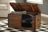 Kettleby Brown Storage Trunk from Ashley - Luna Furniture