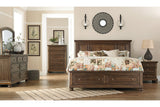 Flynnter Medium Brown Queen Panel Bed with 2 Storage Drawers from Ashley - Luna Furniture