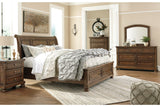 Flynnter Medium Brown Queen Sleigh Bed with 2 Storage Drawers from Ashley - Luna Furniture