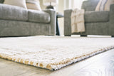 Adanmund Beige/Caramel 8' x 10' Rug from Ashley - Luna Furniture