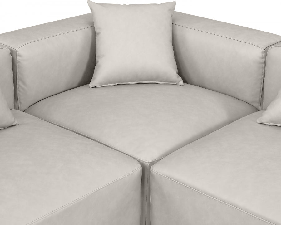 Cube Faux Leather Sectional Cream from Meridian - Luna Furniture