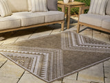 Dunsler Brown/Cream 5' x 7' Rug from Ashley - Luna Furniture