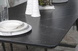 Smith Black/Gunmetal Rectangle Ceramic Top Dining Table from Coaster - Luna Furniture