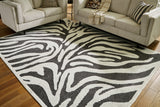 Thomwith Black/Ivory Large Rug from Ashley - Luna Furniture