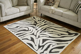 Thomwith Black/Ivory Medium Rug from Ashley - Luna Furniture