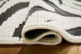 Thomwith Black/Ivory Medium Rug from Ashley - Luna Furniture