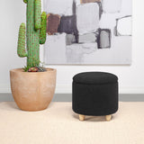 Valia Faux Sheepskin Upholstered Round Storage Ottoman Black from Coaster - Luna Furniture