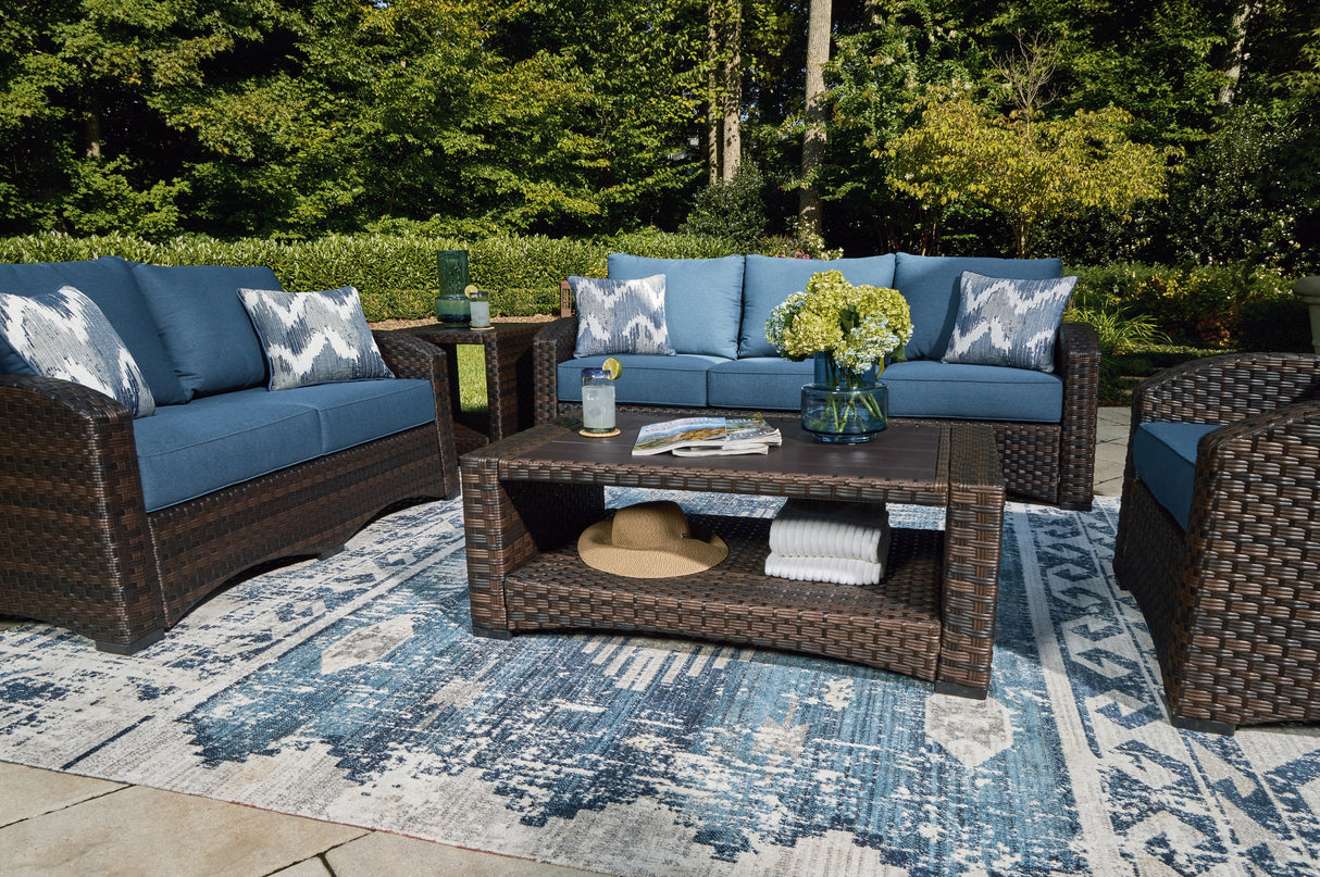 Windglow Brown Outdoor Coffee Table from Ashley - Luna Furniture